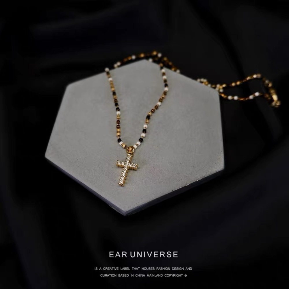 Her Universe Gold and Black Beaded Cross Necklace